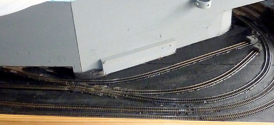 The branch line fiddle yard at the right-hand end of the layout (from the operator's point-of-view) was found to be lacking in storage space (even after all these years), so in early March it was upgraded and will eventually be connected to the main fiddle yard. There's still possibly room for one more siding too - after photo.