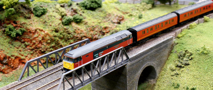 A Rail Express Systems Class 47 heads west with the afternoon down parcels.