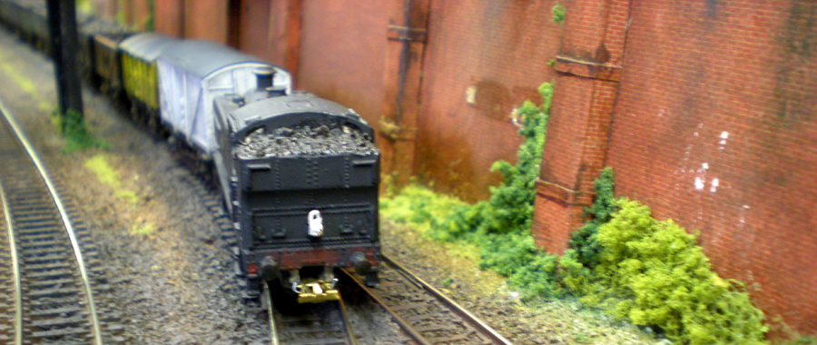 The back end of an ex-GWR pannier tank on a goods service that seems to have been diverted into the loop.